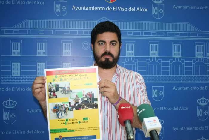 rueda juan con cartel