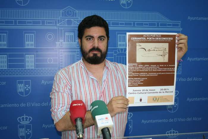 rueda juan con cartel