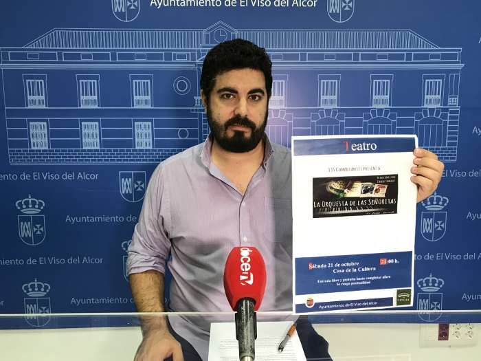 rueda juan con cartel