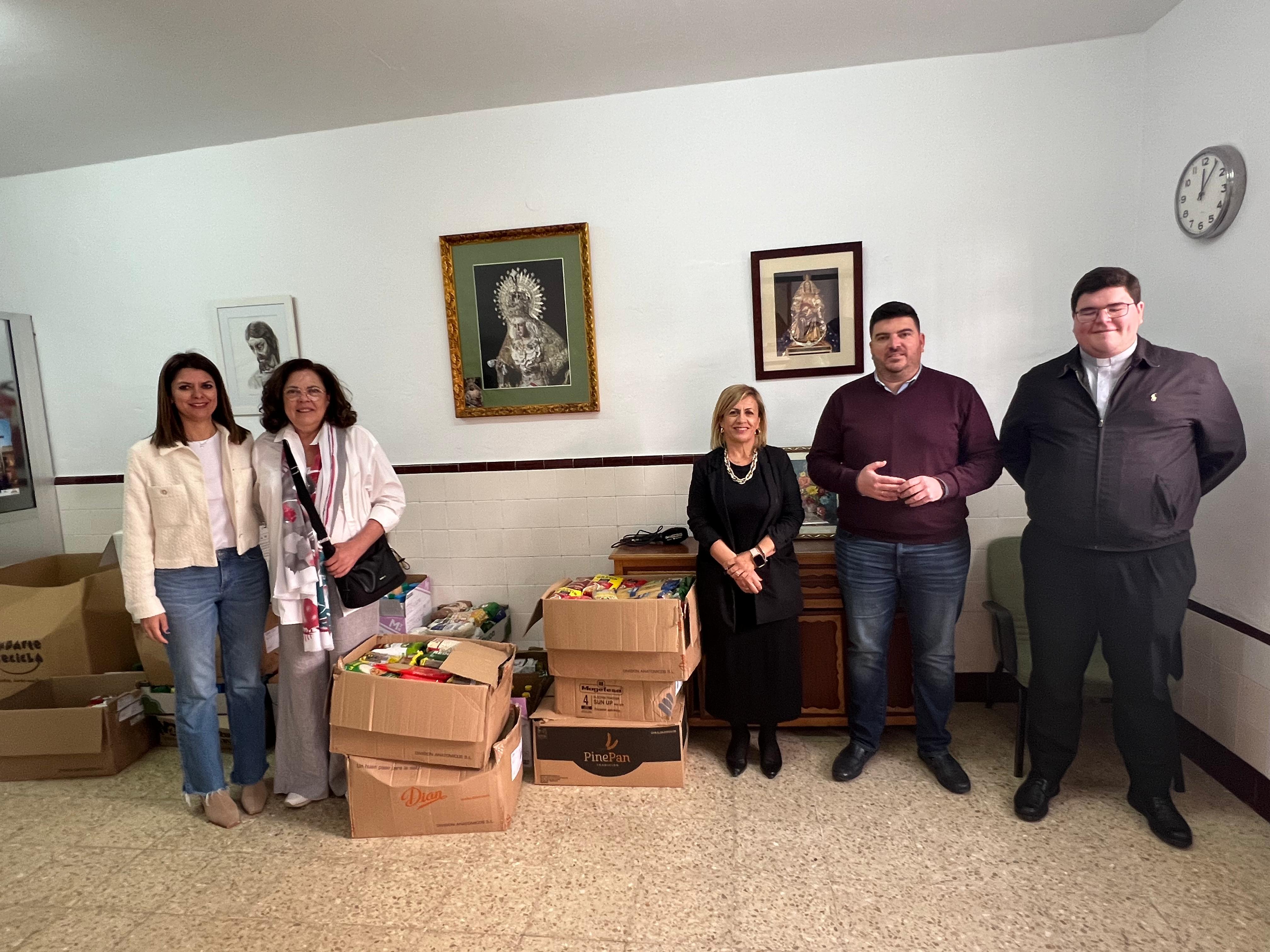 Alimentos cáritas Fiestas de la Santa Cruz